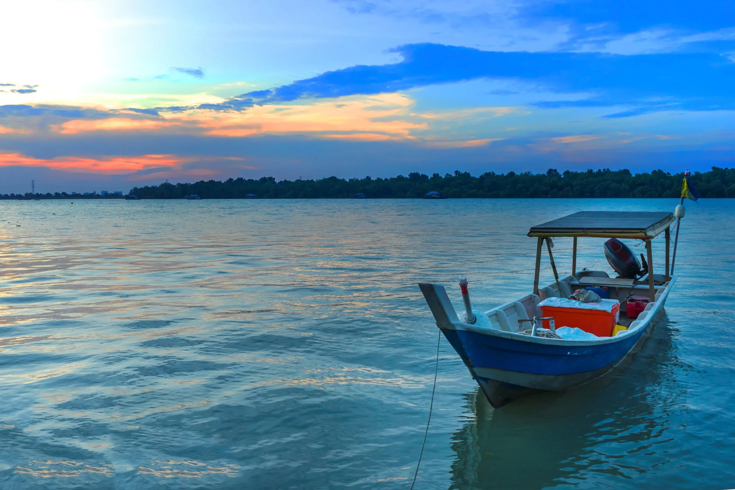 boat moored harbor against sky sunset