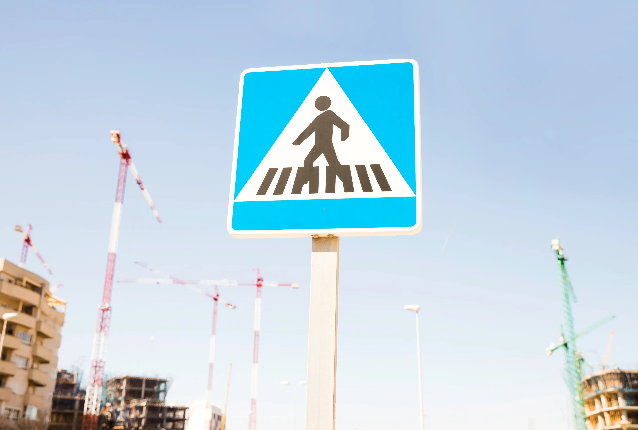 pedestrians warning sign against construction site